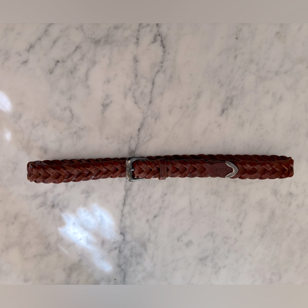 Brown braided leather belt with silver buckle and tip size 34”